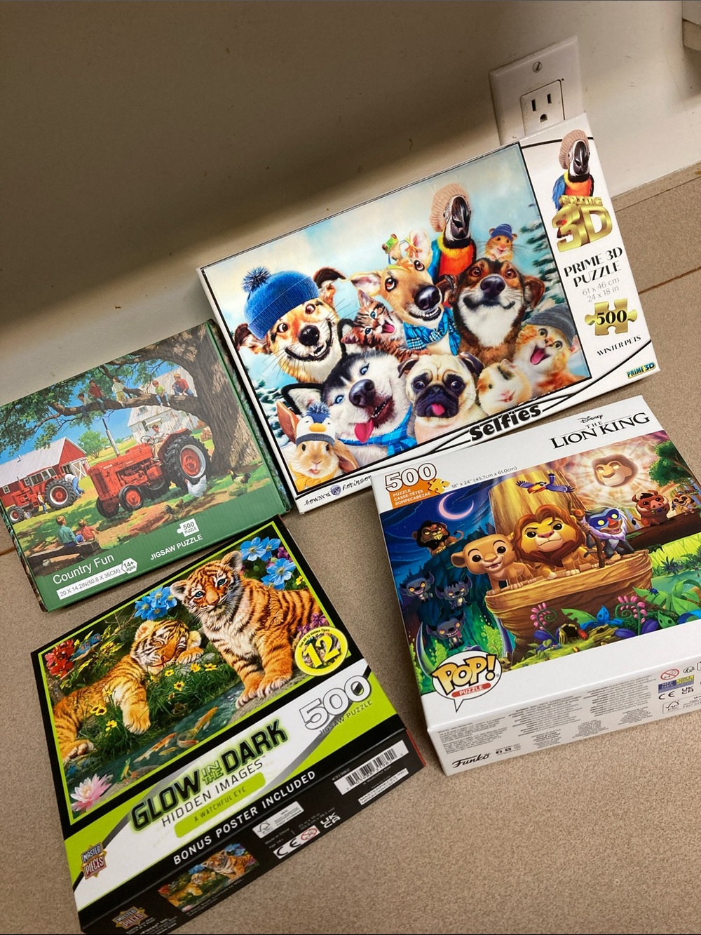 4 assorted puzzles including 500-Piece 'Selfies' Dogs 3d Puzzle